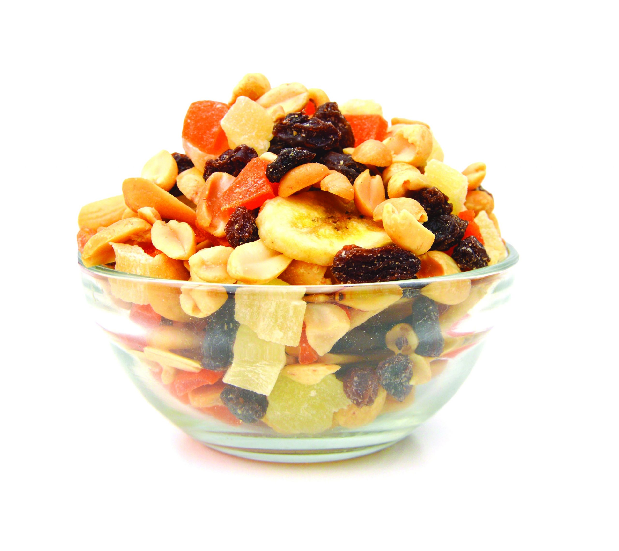Trail mix snack with dried bananas, almond, cashew, peach, cranberries and blueberries.