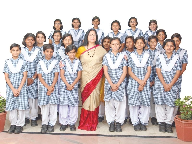 Dr. Amita Chauhan, Chairperson, Amity International Schools with students
