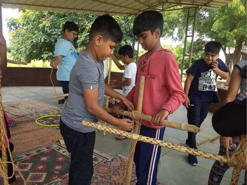 Children busy in hut making