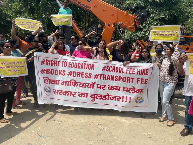 Parents protest school fee hike, ride bulldozer