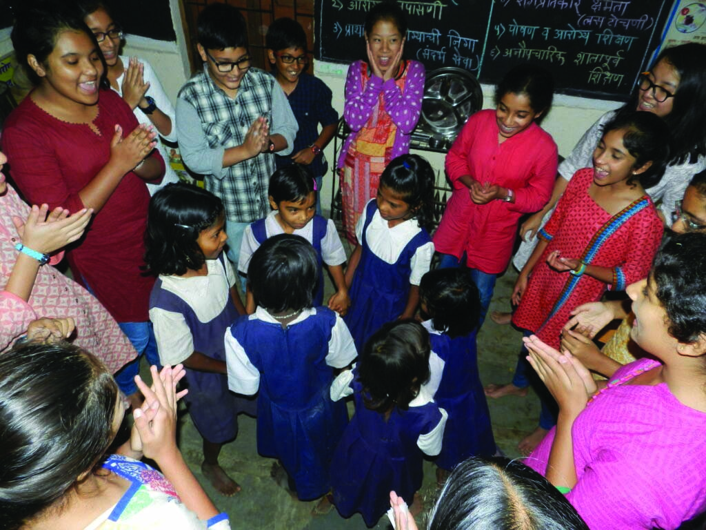 Rishi Valley students with government school children: