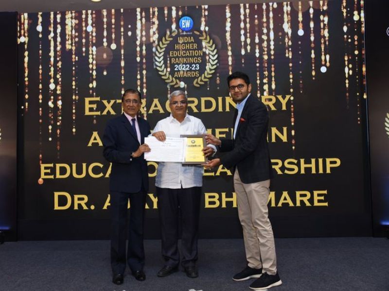Dr. Ajay Bhamare receives award from EducationWorld editor Dilip Thakore & GrayQuest founder-CEO Rishab Mehta (right)