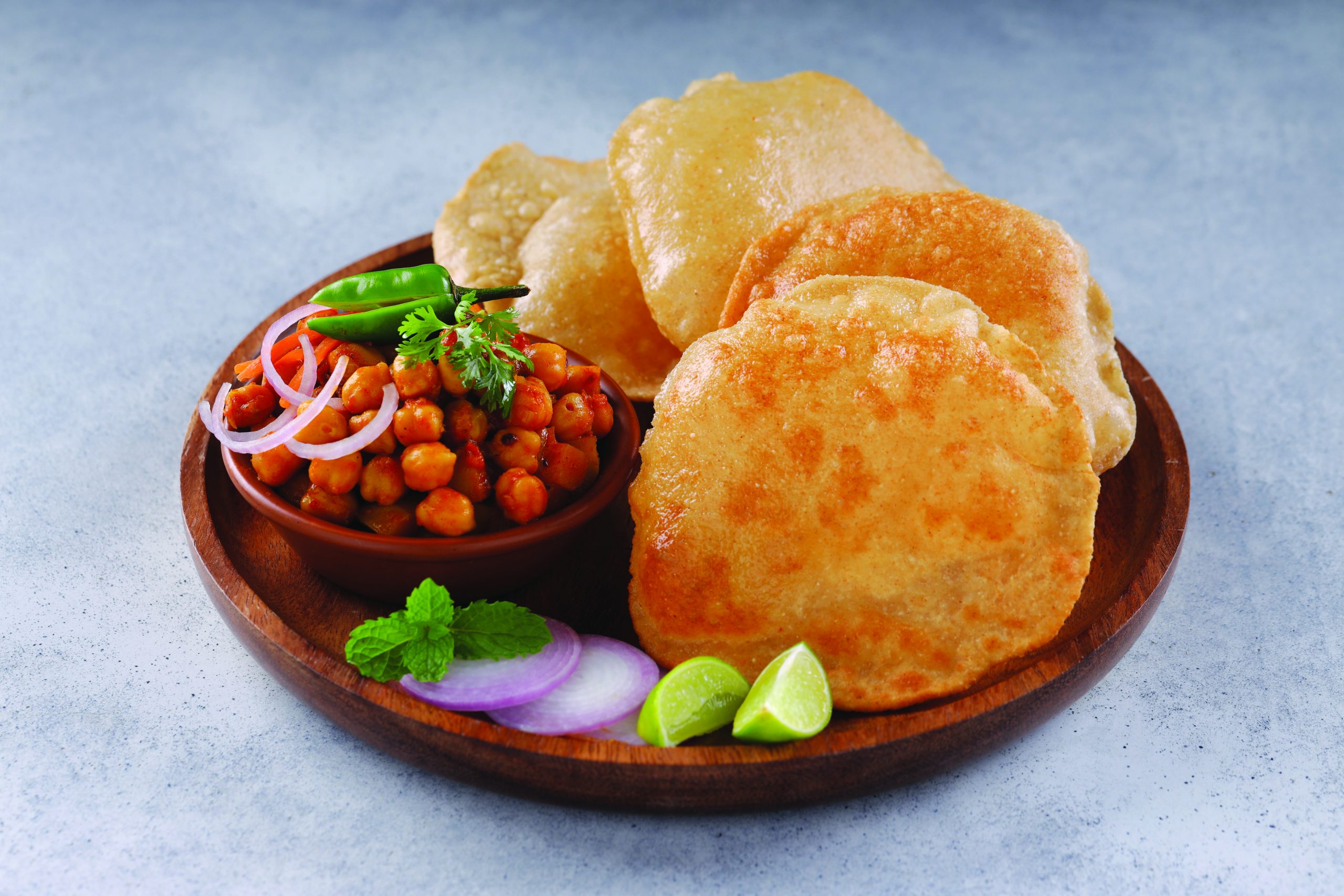Indian,Breakfast,_poori,With,Chickpea,Chana,Masala,Curry,tasty,Indian,Dish