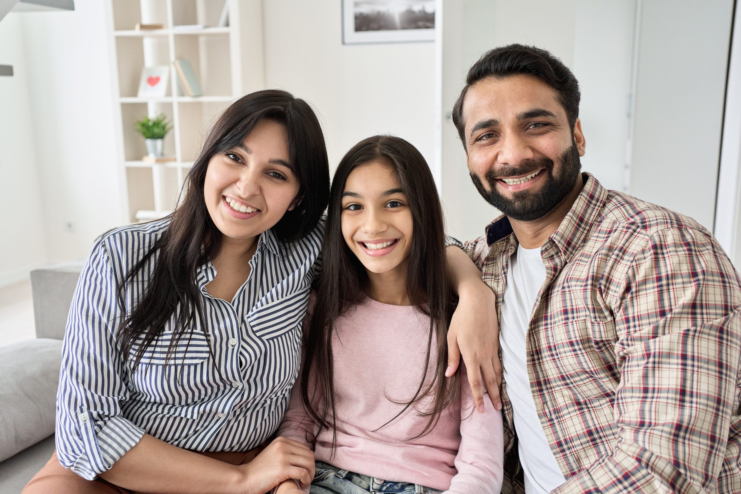 Happy,Indian,Family,Couple,And,Teen,Child,Daughter,Bonding,,Hugging