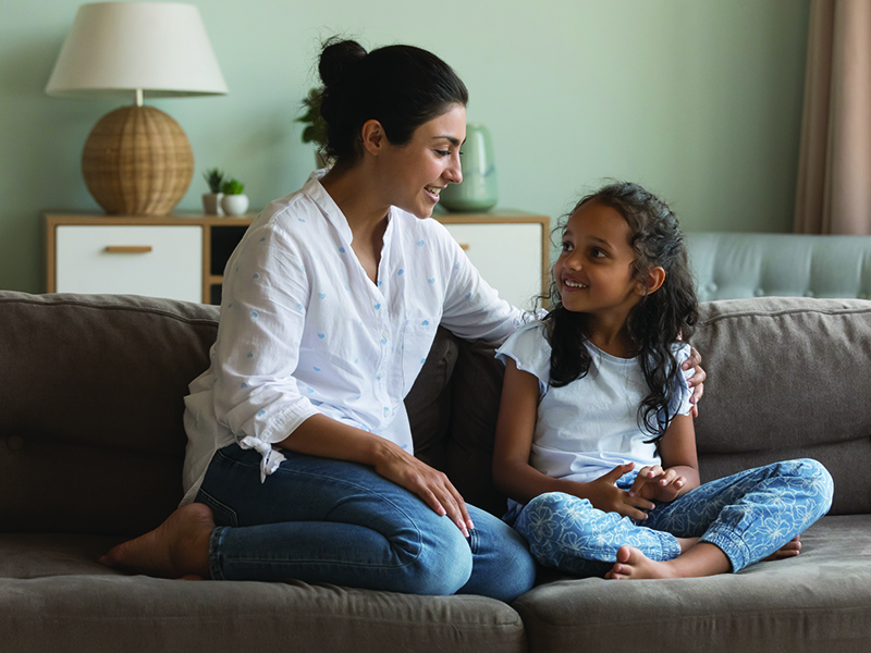Indian,Mom,And,Daughter,Talking,Sit,On,Sofa.,Mum,Having