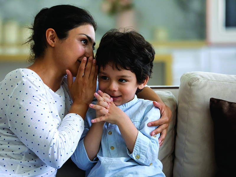 Young,Indian,Woman,Telling,Secret,Whispering,To,Interested,Little,Cute